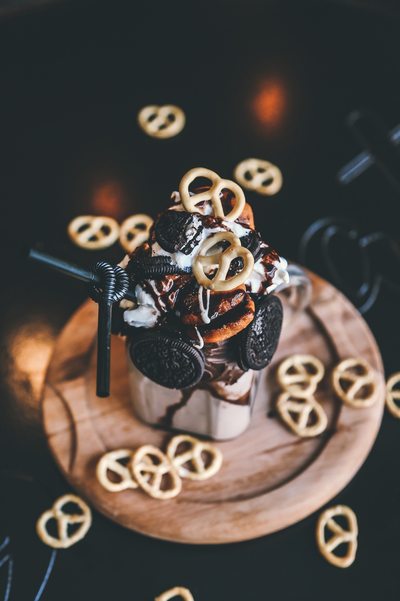 milkshake with oreo crackers cream fruits side view